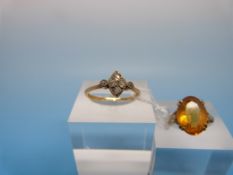 A 9ct gold ring set with a citrine (size