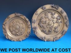 Two Eastern brass chargers with applied