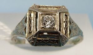 A white metal ring marked Bluite 18k set