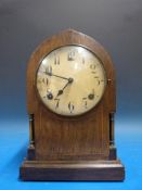 An inlaid Edwardian mantel clock