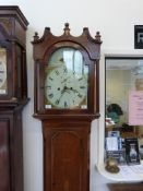 A c1850 8-day long cased clock in light