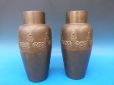 A pair of WMF metal vases in the Japanes