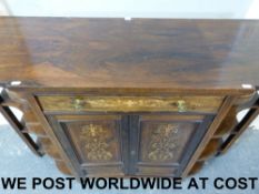 A late 19thC rosewood credenza with foli