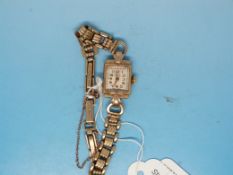 A 9ct gold watch on 9ct gold strap (16.9