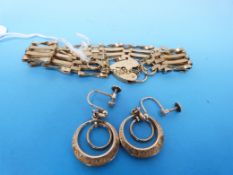 A 9ct gold gate bracelet with hallmarked