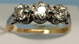 A yellow metal ring marked 18ct & plat s