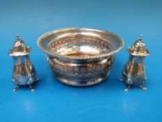 A hallmarked silver wine coaster (12.5cm