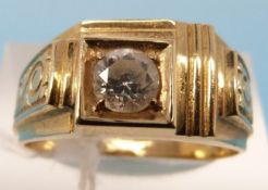A yellow metal ring marked 585 set with