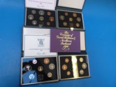 Four sets of Royal Mint cased proof UK c
