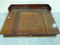 A 19thC mahogany clerks desk with lift u
