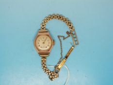 A 9ct gold ladies wristwatch on strap al