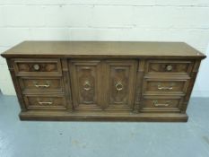 A reproduction sideboard with cupboard f