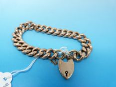 A yellow metal link bracelet marked 9ct