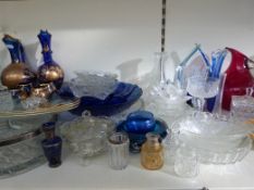A large collection of decorative glasswa