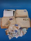 A quantity of loose stamps and stamps on