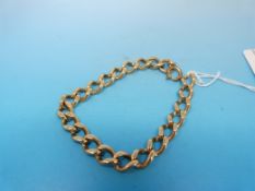 A yellow metal link bracelet marked 9ct