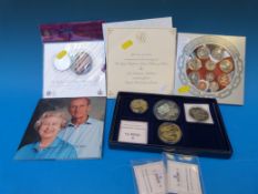 A quantity of UK Crowns and coin sets in