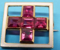 A square yellow metal brooch set with fi