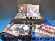 An eclectic mix of CDs including blues,