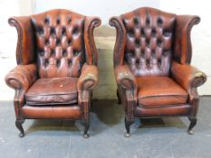 WITHDRAWN Three wing back leather chairs