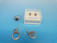 A silver ring set with diamonds and two