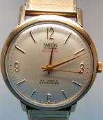 A yellow metal Smiths Everest gentleman'