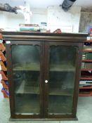 A glazed display/bookcase (width 86cm de