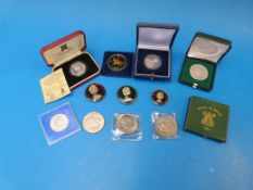 A silver proof 1979 50 pence piece toget