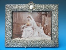 A hallmarked silver embossed photograph