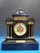 A c1909 slate mantel clock, presented by