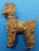 An 18ct gold brooch in the form of a poo