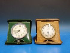 Two vintage travel clocks, one by Brevet