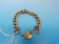 A yellow metal link bracelet marked 9ct