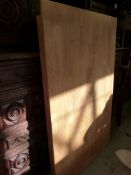 A contemporary light ash/beech table (L1