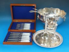 A quantity of silver plate including pun