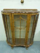 An Art Deco style glazed display cabinet