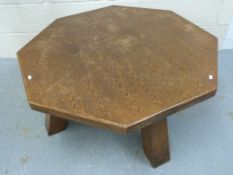 A large octagonal oak coffee table (W101