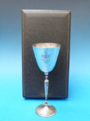 A cased silver goblet commemorating the