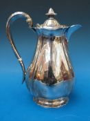 A hallmarked silver hot water jug, Sheff