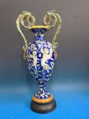 An Italian amphora-shaped vase with snak