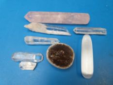 A collection of crystals including a ros