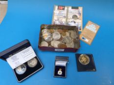 A collection of coins including cased si