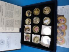 Twelve embellished commemorative crowns,