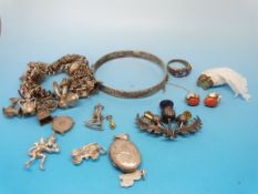 A pair of 9ct gold earrings set with cor