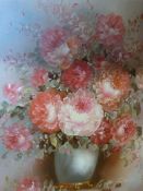 Oil on canvas still life of flowers in a