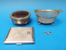 A silver cigarette case with gilt interi