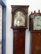 An early 19thC long case clock with eigh