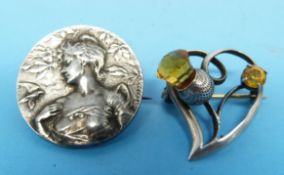 An Art Nouveau French brooch with female