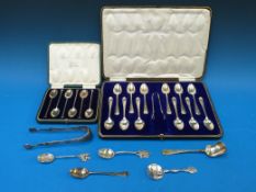 A cased set of 12 hallmarked silver teas