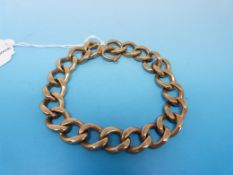 A hallmarked 9ct gold kerb link bracelet